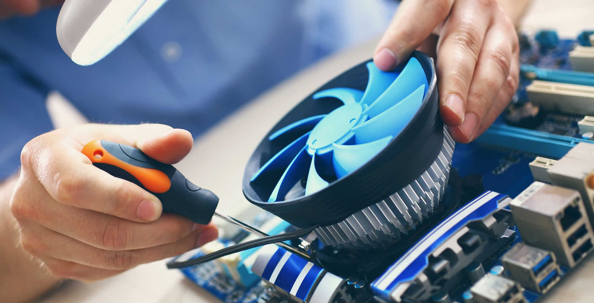 Computer repair expert fixing a PC